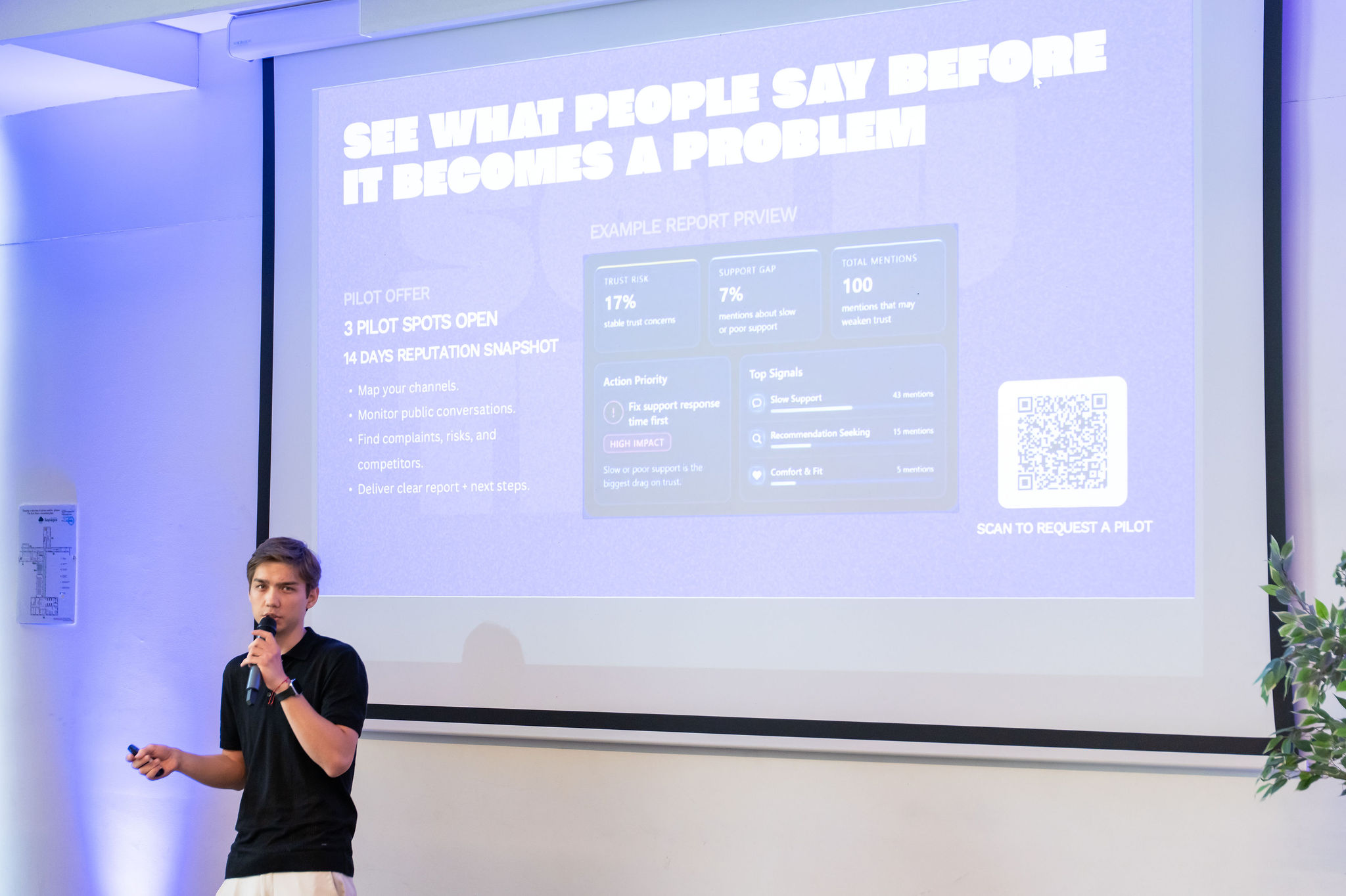 Amet on stage during a pitch presentation